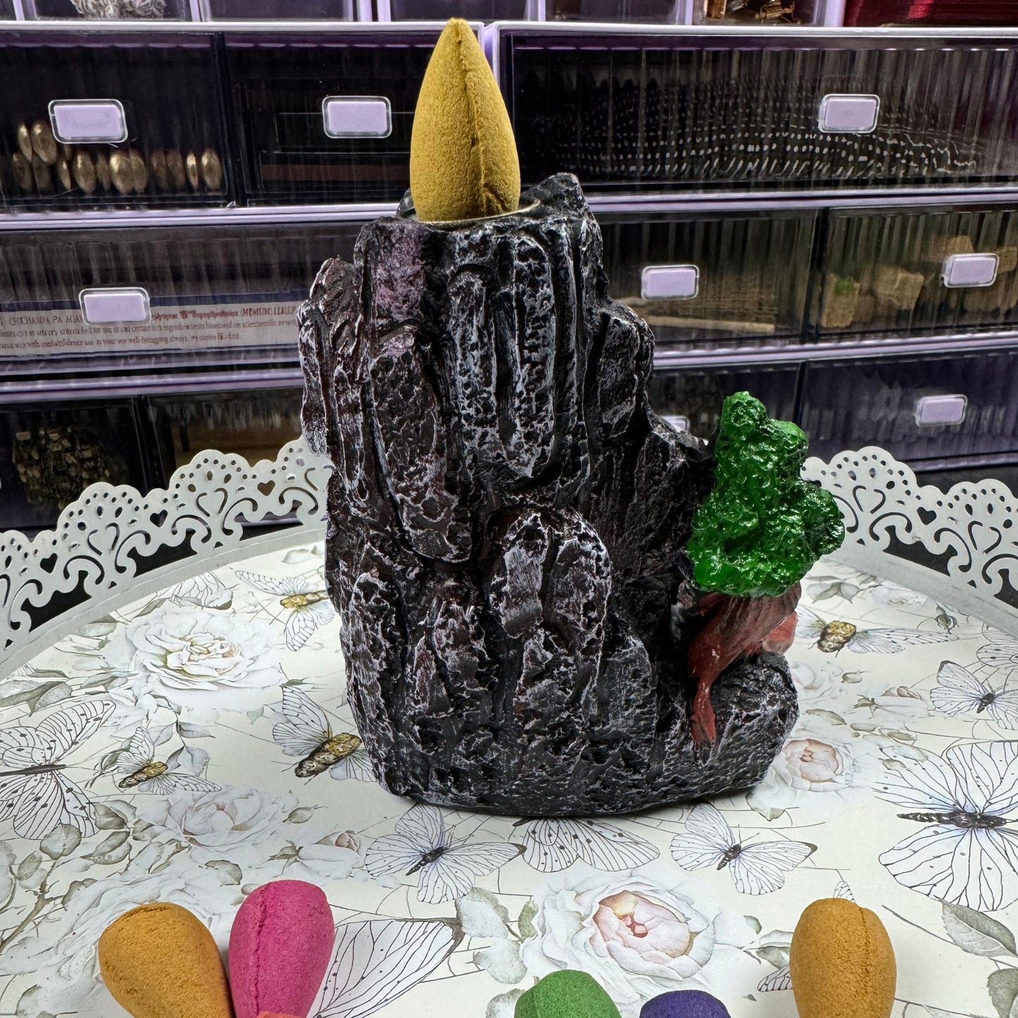 Backside of an incense burner shaped like a mountain