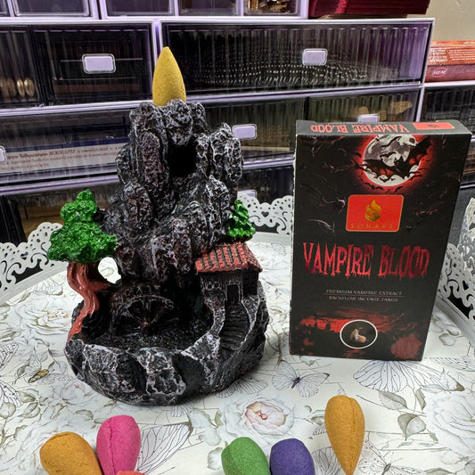Decorative incense fountain next to a box labeled 'Vampire Blood'.